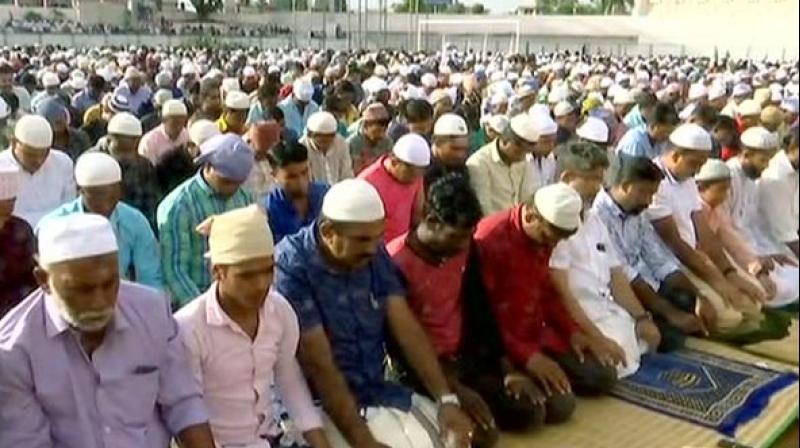 Hundreds of people offered prayers at Chandrasekharan Nair Stadium in Thiruvananthapuram on Friday to mark the end of the holy month. (Photo: ANI) Hundreds of people offered prayers at Chandrasekharan Nair Stadium in Thiruvananthapuram on Friday to mark the end of the holy month. (Photo: ANI)