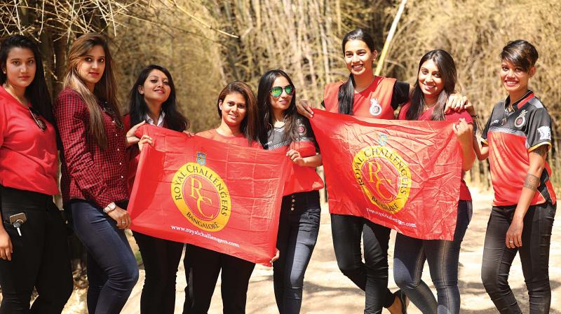 RCB fans cheer for their team RCB fans cheer for their team