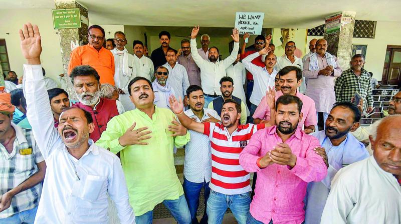Ticket seekers and supporters demonstrate outside Bihar Congress’ office in Patna on Friday. (PTI) Ticket seekers and supporters demonstrate outside Bihar Congress’ office in Patna on Friday. (PTI)