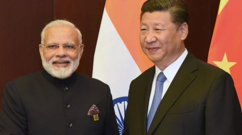 A senior Chinese official said it should be left to PM Modi and Xi Jinping to discuss what they wish to. (Photo: File | AFP) A senior Chinese official said it should be left to PM Modi and Xi Jinping to discuss what they wish to. (Photo: File | AFP)