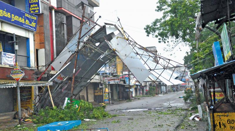 A front portion of the steel structure of a private shop at Pudukkottai west street collapsed due to heavy wind on Friday. A front portion of the steel structure of a private shop at Pudukkottai west street collapsed due to heavy wind on Friday.