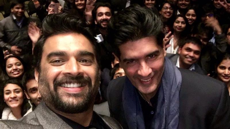 Maddy taking selfie with Manish and Harvard students. Maddy taking selfie with Manish and Harvard students.