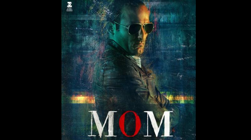 The poster has Akshaye wearing black aviators with a stoic expression. The poster has Akshaye wearing black aviators with a stoic expression.