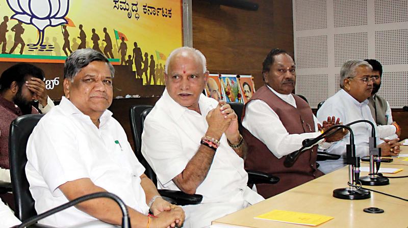 Senior BJP leaders Jagadish Shettar, B.S. Yeddyurappa and K.S. Eshwarappa at a party meeting in Bengaluru on Tuesday. (Image KPN) Senior BJP leaders Jagadish Shettar, B.S. Yeddyurappa and K.S. Eshwarappa at a party meeting in Bengaluru on Tuesday. (Image KPN)