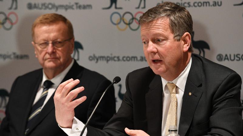 In this file photo, Australian Olympic Committee (AOC) chief executive officer Matt Carroll (R) and AOC president John Coates address a press conference where they reaffirmed plans to send athletes to Tokyo 2020. AFP Photo In this file photo, Australian Olympic Committee (AOC) chief executive officer Matt Carroll (R) and AOC president John Coates address a press conference where they reaffirmed plans to send athletes to Tokyo 2020. AFP Photo