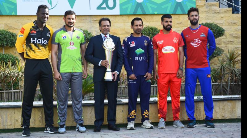 Pakistan's former squash world champion Jahangir Khan (with the PSL trophy) along with captains of five participating teams (from left) Darren Sammy, Sohail Akhtar, Sarfaraz Ahmed, Shadab Khan and Imad Wasim at the National Stadium in Karachi. AP Photo Pakistan's former squash world champion Jahangir Khan (with the PSL trophy) along with captains of five participating teams (from left) Darren Sammy, Sohail Akhtar, Sarfaraz Ahmed, Shadab Khan and Imad Wasim at the National Stadium in Karachi. AP Photo