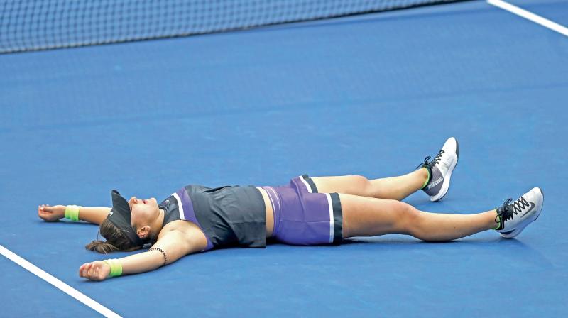 Bianca Andreescu of Canada celebrates after winning the women's singles final against Serena_Williams of the United States at the 2019 US Open at the USTA Billie Jean King National Tennis Center. From this year the Center will use Laykold hard courts made by Advanced Polymer Technology. DC File Photo Bianca Andreescu of Canada celebrates after winning the women's singles final against Serena_Williams of the United States at the 2019 US Open at the USTA Billie Jean King National Tennis Center. From this year the Center will use Laykold hard courts made by Advanced Polymer Technology. DC File Photo