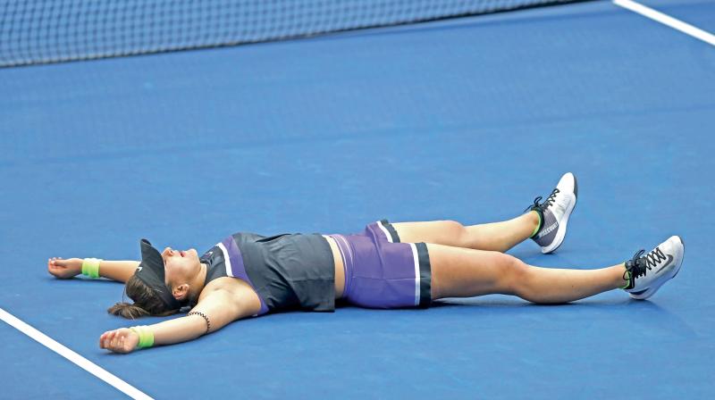 Bianca Andreescu of Canada celebrates after winning the womens singles final against Serena_Williams of the United States at the 2019 US Open at the USTA Billie Jean King National Tennis Center. From this year the Center will use Laykold hard courts made by Advanced Polymer Technology. DC File Photo