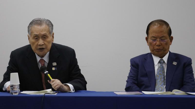 Tokyo 2020 Organizing Committee president Yoshiro Mori (L) and CEO Toshiro Muto at an organising committee meeting. attend a news conference in Tokyo, Tuesday, March 24, 2020. IOC President Thomas Bach has agreed \100%\ to a proposal of postponing the Tokyo Olympics for about one year until 2021 because of the coronavirus outbreak, Japanese Prime Minister Shinzo Abe said Tuesday.AP/PTI(AP24-03-2020_000300B)