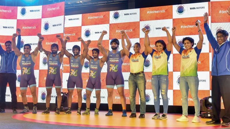 Indian wrestlers Sushil Kumar (from left), Yogeshwar Dutt, Bajrang Punia, Sandeep Tomar, Satyawart Kadian, Geeta Phogat, Sakshi Malik and Pooja Dhanda pose during an event in in Mumbai on Wednesday. (Photo: AP) Indian wrestlers Sushil Kumar (from left), Yogeshwar Dutt, Bajrang Punia, Sandeep Tomar, Satyawart Kadian, Geeta Phogat, Sakshi Malik and Pooja Dhanda pose during an event in in Mumbai on Wednesday. (Photo: AP)
