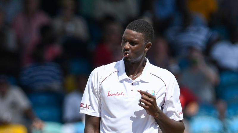 Holder was punished by the International Cricket Council for the team's slow over rate in winning the second Test in Antigua on Saturday. (Photo: AFP) Holder was punished by the International Cricket Council for the team's slow over rate in winning the second Test in Antigua on Saturday. (Photo: AFP)