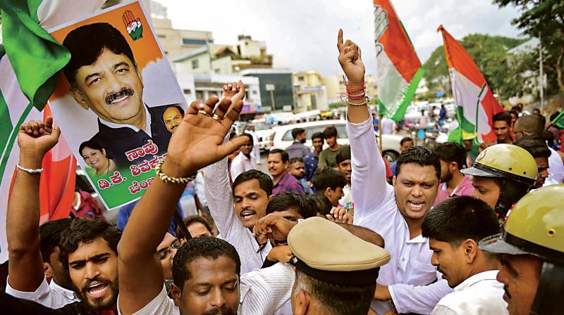 Congress leaders and workers staged protests across the state on Wednesday, daring the BJP’s national leadership to "arrest every Congress leader if this could help revive the sliding economy. Congress leaders and workers staged protests across the state on Wednesday, daring the BJP’s national leadership to "arrest every Congress leader if this could help revive the sliding economy.