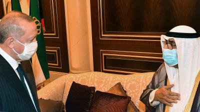 Turkish President Recep Tayyip Erdogan (L) offering his condolences on October 7, 2020 in Kuwait to the Gulf emirate's Crown Prince, Sheikh Mishaal al-Ahmad al-Jabaer al-Sabah, following the death of the emir of Kuwait last week. (AFP)