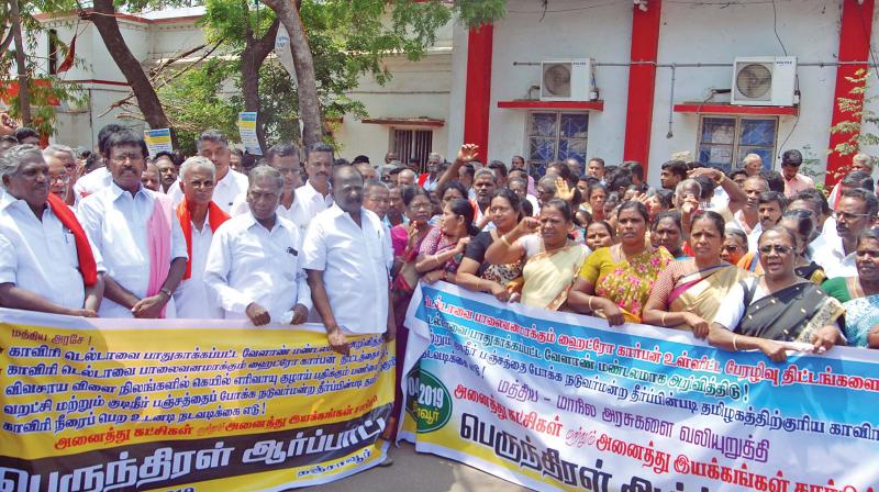Opposition patry cadres, led by S.S. Palanimanickam and G.Palanisamy, National council member of CPI, agitating against proposed hydrocarbon project at Thanjavur on Tuesday. (Photo: DC) Opposition patry cadres, led by S.S. Palanimanickam and G.Palanisamy, National council member of CPI, agitating against proposed hydrocarbon project at Thanjavur on Tuesday. (Photo: DC)
