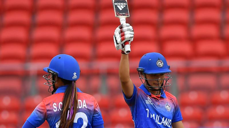 Thailand's Natthakan Chantam celebrates her half century during the Twenty20 women's World Cup match against Pakistan in Sydney on Tuesday. AFP Photo Thailand's Natthakan Chantam celebrates her half century during the Twenty20 women's World Cup match against Pakistan in Sydney on Tuesday. AFP Photo