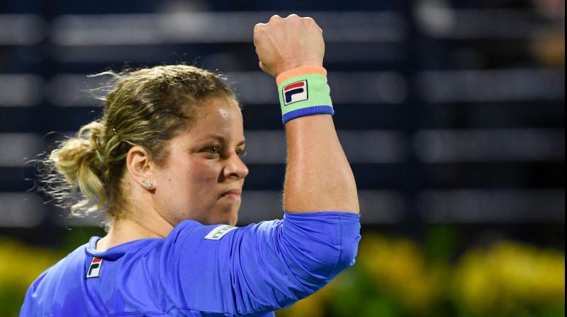 Belgiums former World No.1 Kim Clijsters reacts after winning a point during her first round match at the WTA tournament in Monterry, Mexico, against Johanna Konta of Britain on Wednesday. AFP Photo