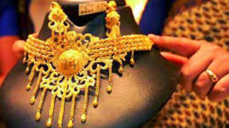 Overseas, the yellow metal edged up 0.07 per cent to USD 1,251.60 an ounce while silver slipped 0.26 per cent to USD 17 an ounce in Singapore. Overseas, the yellow metal edged up 0.07 per cent to USD 1,251.60 an ounce while silver slipped 0.26 per cent to USD 17 an ounce in Singapore.