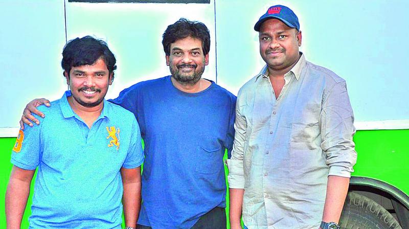 Sampoornesh Babu and Sai Rajesh, producer of Kobbari Matta, met Puri Jagannadh for the unveiling of a song trailer recently Sampoornesh Babu and Sai Rajesh, producer of Kobbari Matta, met Puri Jagannadh for the unveiling of a song trailer recently