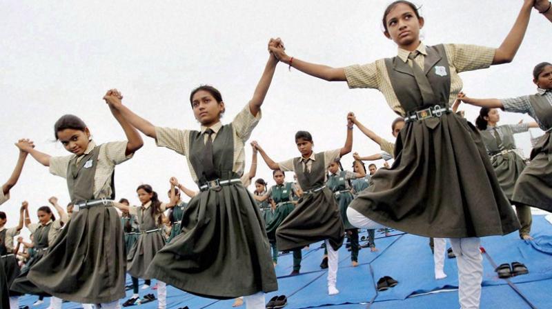 The plea said that right to health cannot be secured without providing 'yoga and health education' to all children or without framing a 'national yoga policy' to promote and propagate it. (Photo: PTI) The plea said that right to health cannot be secured without providing 'yoga and health education' to all children or without framing a 'national yoga policy' to promote and propagate it. (Photo: PTI)