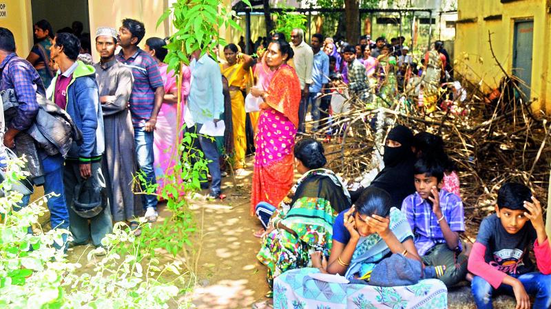 People stand in a queue waiting for doctor’s consultation at Fever Hospital on Saturday. (Photo: Deepak Deshpande) People stand in a queue waiting for doctor’s consultation at Fever Hospital on Saturday. (Photo: Deepak Deshpande)
