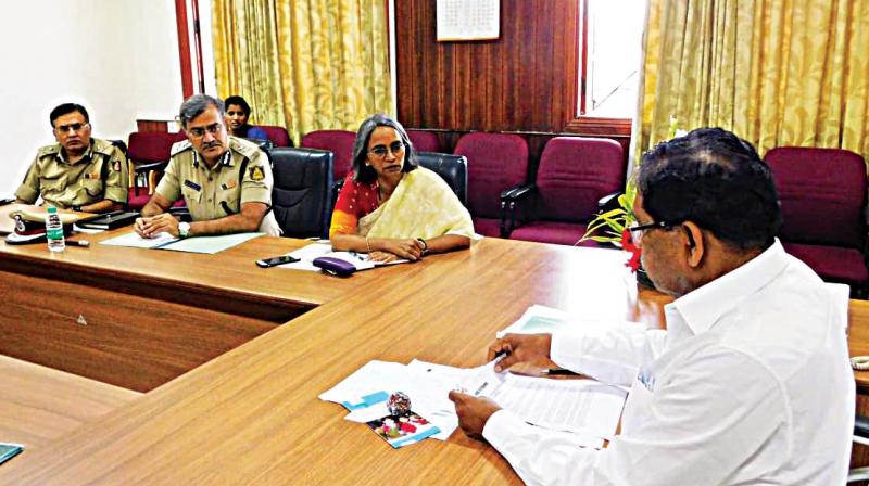 A file photo of Home Minister G. Parameshwar holding a meeting with top police officers in Bengaluru A file photo of Home Minister G. Parameshwar holding a meeting with top police officers in Bengaluru