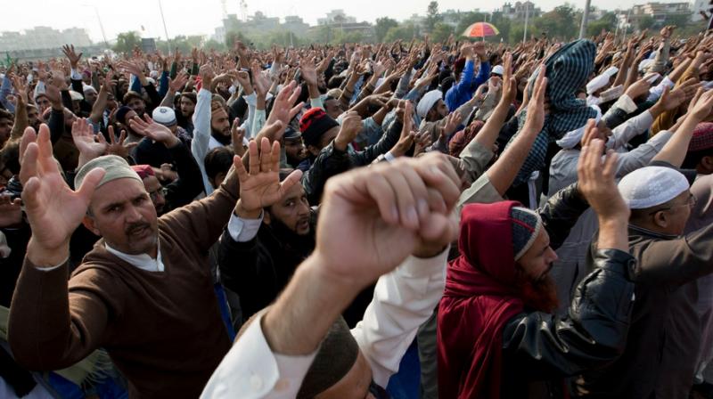 The previously obscure Islamist group has been calling for weeks for Hamid's ousting over a hastily-abandoned amendment to the oath which election candidates must swear. (Photo: AP) The previously obscure Islamist group has been calling for weeks for Hamid's ousting over a hastily-abandoned amendment to the oath which election candidates must swear. (Photo: AP)