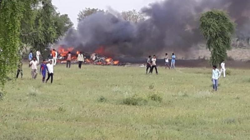 An Indian Air Force MiG 27 aircraft crashed on a field in Jodhpur's Banad area in Rajasthan on Tuesday morning. (Photo: Twitter | ANI) An Indian Air Force MiG 27 aircraft crashed on a field in Jodhpur's Banad area in Rajasthan on Tuesday morning. (Photo: Twitter | ANI)