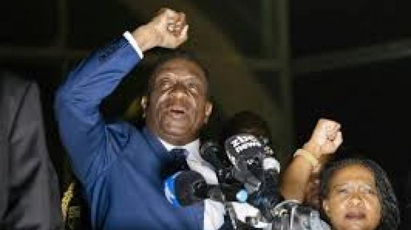 Emmerson Mnangagwa known as "The Crocodile" wore a dark suit, red tie and matching handkerchief, and a row of medals on his chest for the ceremony. (Photo: AFP) Emmerson Mnangagwa known as "The Crocodile" wore a dark suit, red tie and matching handkerchief, and a row of medals on his chest for the ceremony. (Photo: AFP)