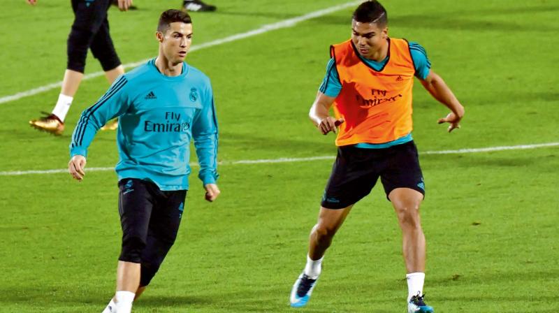 Real Madrid’s Cristiano Ronaldo (left) at a training session in Abu Dhabi on Tuesday, the eve of his team’s Fifa Club World Cup semi-final against Al Jazira (Photo: AFP) Real Madrid’s Cristiano Ronaldo (left) at a training session in Abu Dhabi on Tuesday, the eve of his team’s Fifa Club World Cup semi-final against Al Jazira (Photo: AFP)
