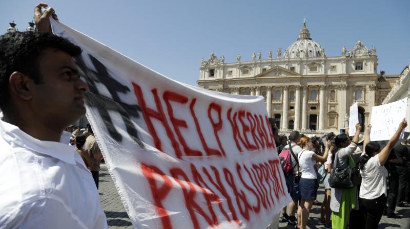 A banner in support of the people of Kerala during Pope Francis' Angelus noon prayer at St. Peter's Square at the Vatican on Sunday. (Photo: AP) A banner in support of the people of Kerala during Pope Francis' Angelus noon prayer at St. Peter's Square at the Vatican on Sunday. (Photo: AP)