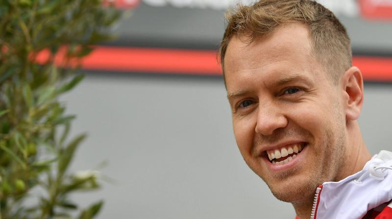 Sebastian Vettel and his Ferrari team-mate Kimi Raikkonen reeled off a convincing one-two. (Photo: AP) Sebastian Vettel and his Ferrari team-mate Kimi Raikkonen reeled off a convincing one-two. (Photo: AP)