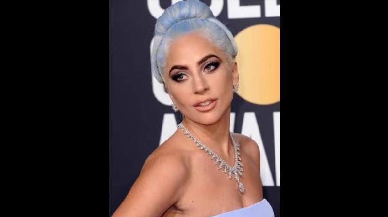 Lady Gaga wearing Platinum Jewelry. Lady Gaga wearing Platinum Jewelry.