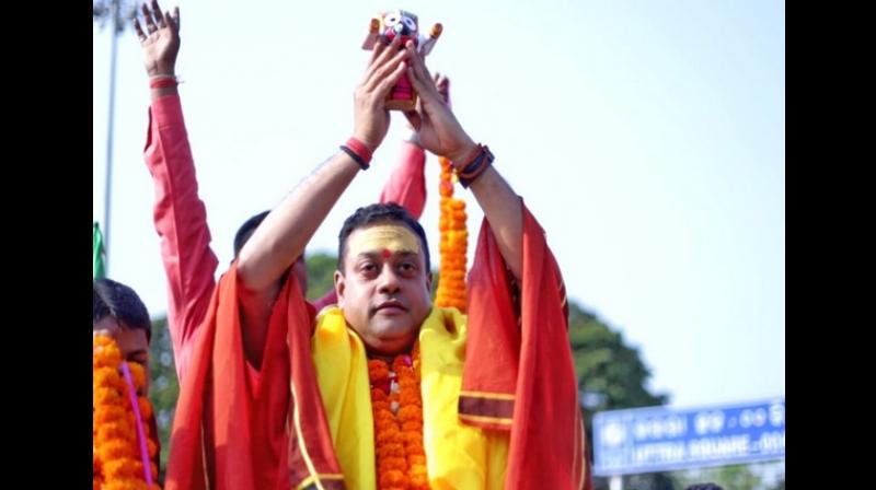 In a petition submitted with the CEO, the Congress said, 'In an election rally, Patra showed and held the idol of Lord Jagannath in his hand and used the photographs of the deity in his social media account.' (Photo: ANI) In a petition submitted with the CEO, the Congress said, 'In an election rally, Patra showed and held the idol of Lord Jagannath in his hand and used the photographs of the deity in his social media account.' (Photo: ANI)