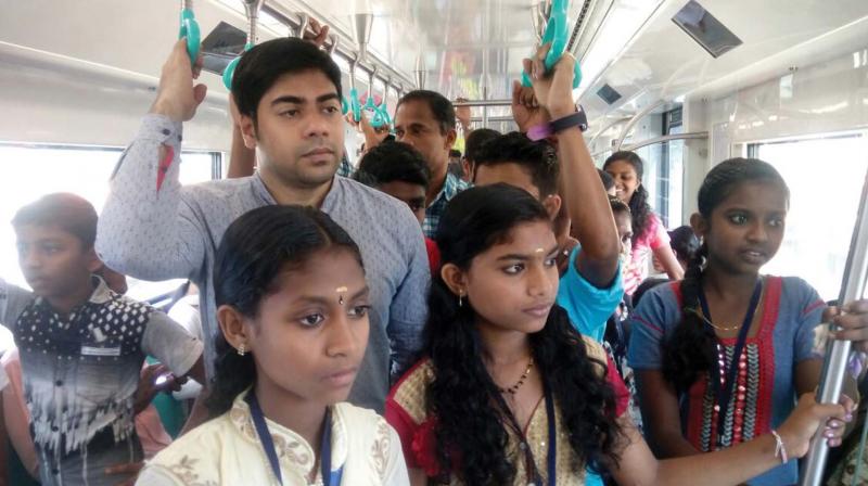 Tribal children enjoy the metro ride with Wayanad district collector S. Suhas. Tribal children enjoy the metro ride with Wayanad district collector S. Suhas.