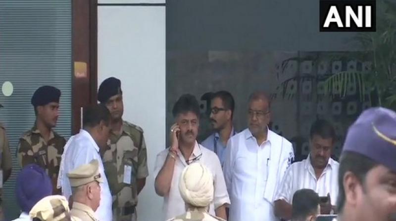'Let Mumbai Police or any other force be deployed. Let them do their duty. We have come to meet our friends. We were born together in politics, we will die together in politics. They are our party men. We have come to meet them,' Shivakumar said. (Photo: ANI) 'Let Mumbai Police or any other force be deployed. Let them do their duty. We have come to meet our friends. We were born together in politics, we will die together in politics. They are our party men. We have come to meet them,' Shivakumar said. (Photo: ANI)
