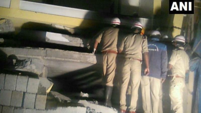 State Disaster Response Fund (SDRF) conducted a rescue operation at the spot and rescued six persons from under the debris. (Photo: ANI) State Disaster Response Fund (SDRF) conducted a rescue operation at the spot and rescued six persons from under the debris. (Photo: ANI)