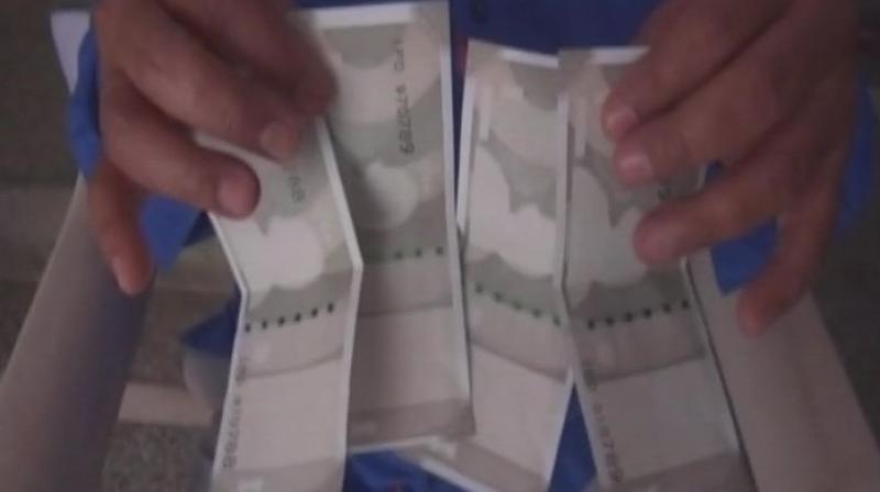 The latest victim is Gowardhan Sharma, who received the counterfeit Rs 500 notes from an SBI ATM. (Photo: ANI/Twitter) The latest victim is Gowardhan Sharma, who received the counterfeit Rs 500 notes from an SBI ATM. (Photo: ANI/Twitter)