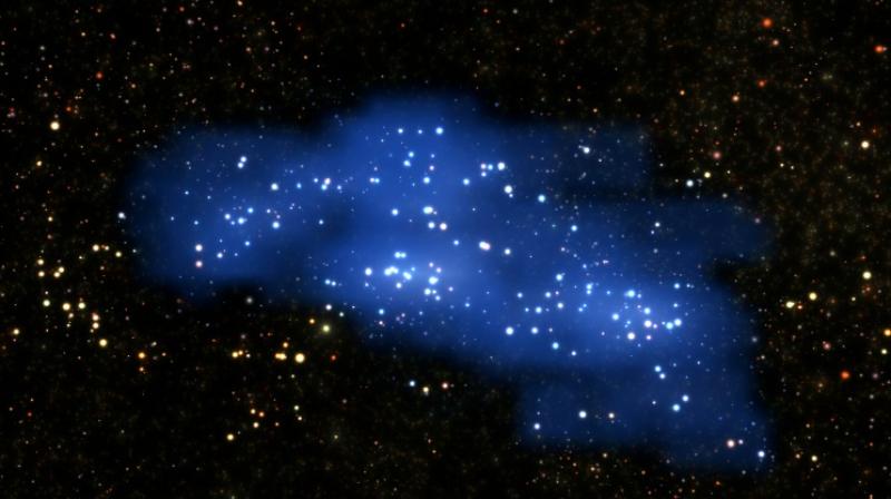 Its titanic mass is one million billion times that of the Sun. Its titanic mass is one million billion times that of the Sun.