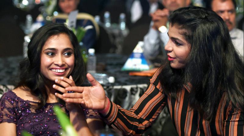Indian trailblazing gymnast Dipa Karmakar and wrestler Sakshi Malik received the coveted Padma Shri Award from President Pranab Mukherjee in New Delhi on Thursday. (Photo: PTI) Indian trailblazing gymnast Dipa Karmakar and wrestler Sakshi Malik received the coveted Padma Shri Award from President Pranab Mukherjee in New Delhi on Thursday. (Photo: PTI)