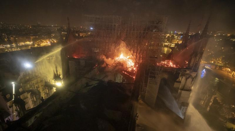 This aerial photo provided Tuesday April 16, 2019 by the Paris Fire Brigade shows Notre Dame cathedral burning. (Photo:AP) This aerial photo provided Tuesday April 16, 2019 by the Paris Fire Brigade shows Notre Dame cathedral burning. (Photo:AP)