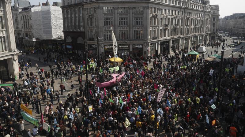 A general view of Oxford Circus occupied by climate change protesters during a demonstration in London. (Photo:AP) A general view of Oxford Circus occupied by climate change protesters during a demonstration in London. (Photo:AP)