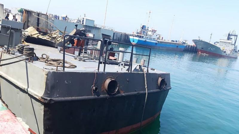 The Konarak support vessel which was struck during a training exercise in the Gulf of Oman, is docked in an unidentified naval base in Iran.(Photo provided by the Iranian Army)