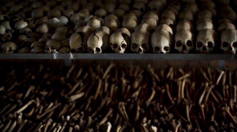 The skulls and bones of some of those who were slaughtered as they sought refuge inside the church are laid out as a memorial to the thousands who were killed in and around the Catholic church during the 1994 genocide in Ntarama, Rwanda. (AP)