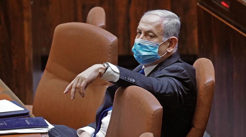 A handout picture released by the Israeli Knesset (parliament) spokespersons office on May 17, 2020, shows Israeli Prime Minister Benjamin Netanyahu attending a parliamentary session in Jerusalem ahead of the swearing-in ceremony of the new government. (Via AFP)