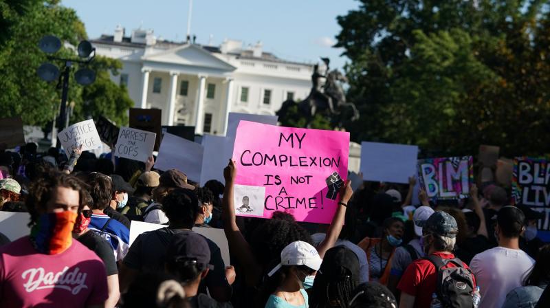 Demonstrators protesting the death of George Floyd, near the White House on May 31, 2020 in Washington, DC. (AFP)