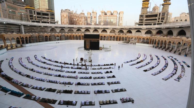 Worshippers gathering before the Kaaba at the Grand Mosque in Saudi Arabias holy city of Mecca to attend prayers. (AFP)