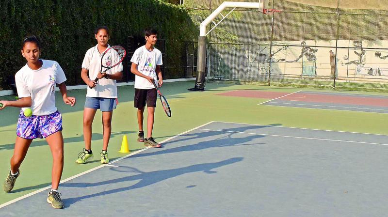 Trainees in action during the three-day tennis camp organised by Academia Sports Village at the Hyderabad Polo and Riding Club complex in Aziz Nagar on the outskirts of Hyderabad.