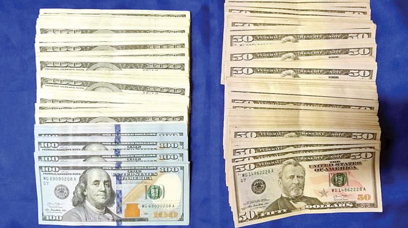 On examination $2,000 in the 50 denomination were found concealed inside the baggage. Later, his check-in baggage was also recalled from the airline and examined. On examination $2,000 in the 50 denomination were found concealed inside the baggage. Later, his check-in baggage was also recalled from the airline and examined.