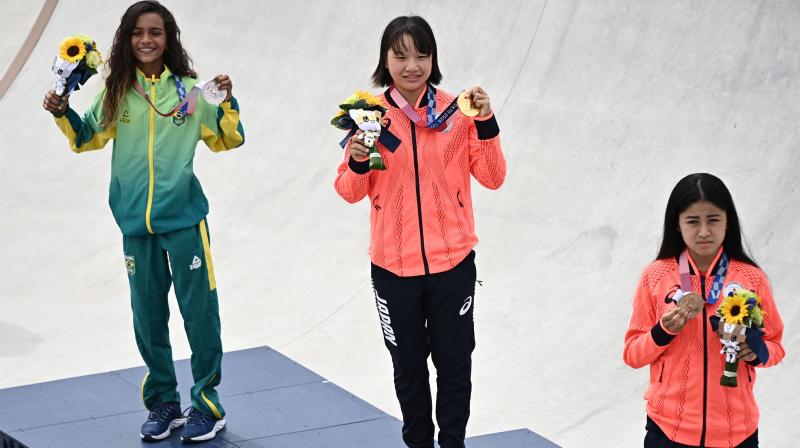 Medal winners will be allowed to take off their mask for 30 seconds on the podium. (Photo: AFP)