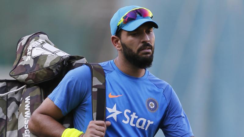 Once a sought-after property, Yuvraj Singh faces the risk of going unsold at the 2019 IPL auction here Tuesday with the franchisees factoring in the availability of foreign players in a World Cup year. (Photo: AP) Once a sought-after property, Yuvraj Singh faces the risk of going unsold at the 2019 IPL auction here Tuesday with the franchisees factoring in the availability of foreign players in a World Cup year. (Photo: AP)